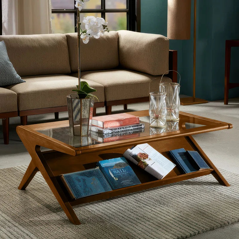 Features a tempered glass top that provides a sturdy surface for drinks or decor Includes a lower shelf that offers convenient storage for reading materials OUCH CART