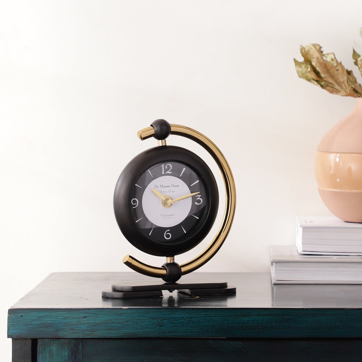 Aleksi 3 mini clock in black and gold M.M.I. OVERSEAS
