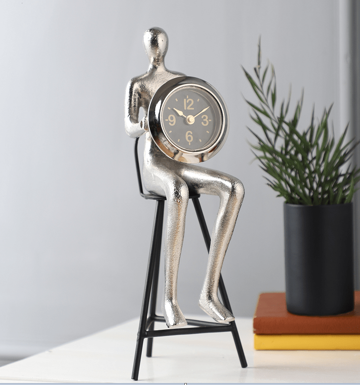 Sitting Man Clock Silver
