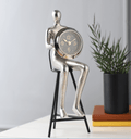 Sitting Man Clock Silver