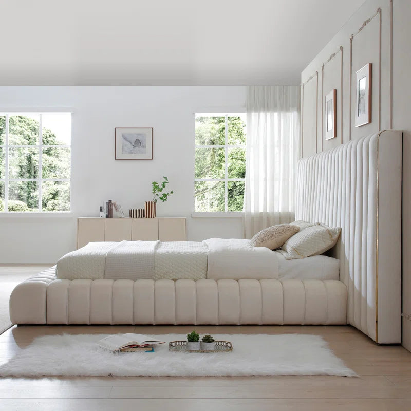 Everly Quinn Avalon Velvet Upholstered Platform Bed With Wings.