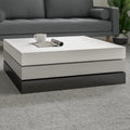 Abstract Geometric Swivel Coffee Table – White & Gray Gloss Finish