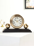 Orbitron table clock in gold
