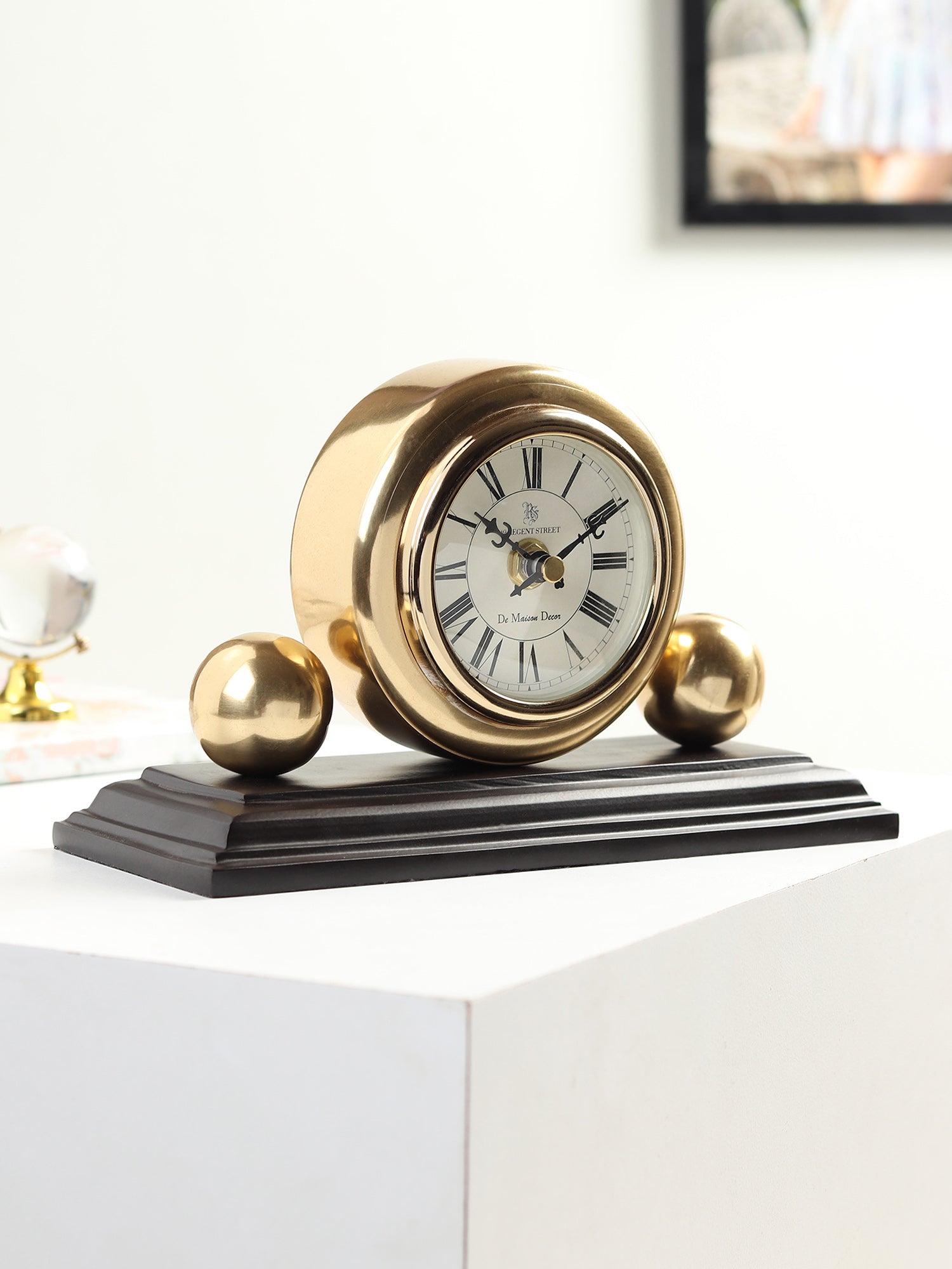 Orbitron table clock in gold