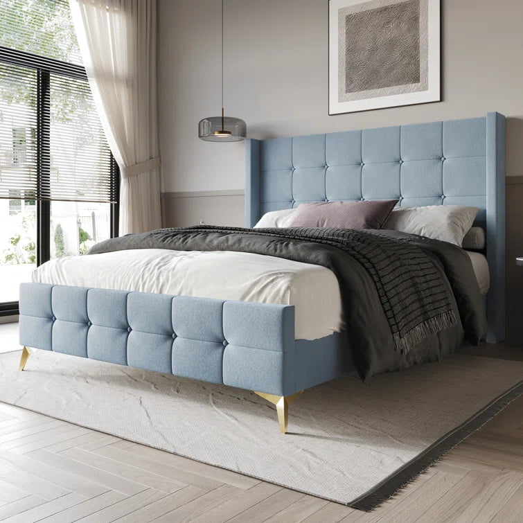 Karmane Upholstered Wingback Bed